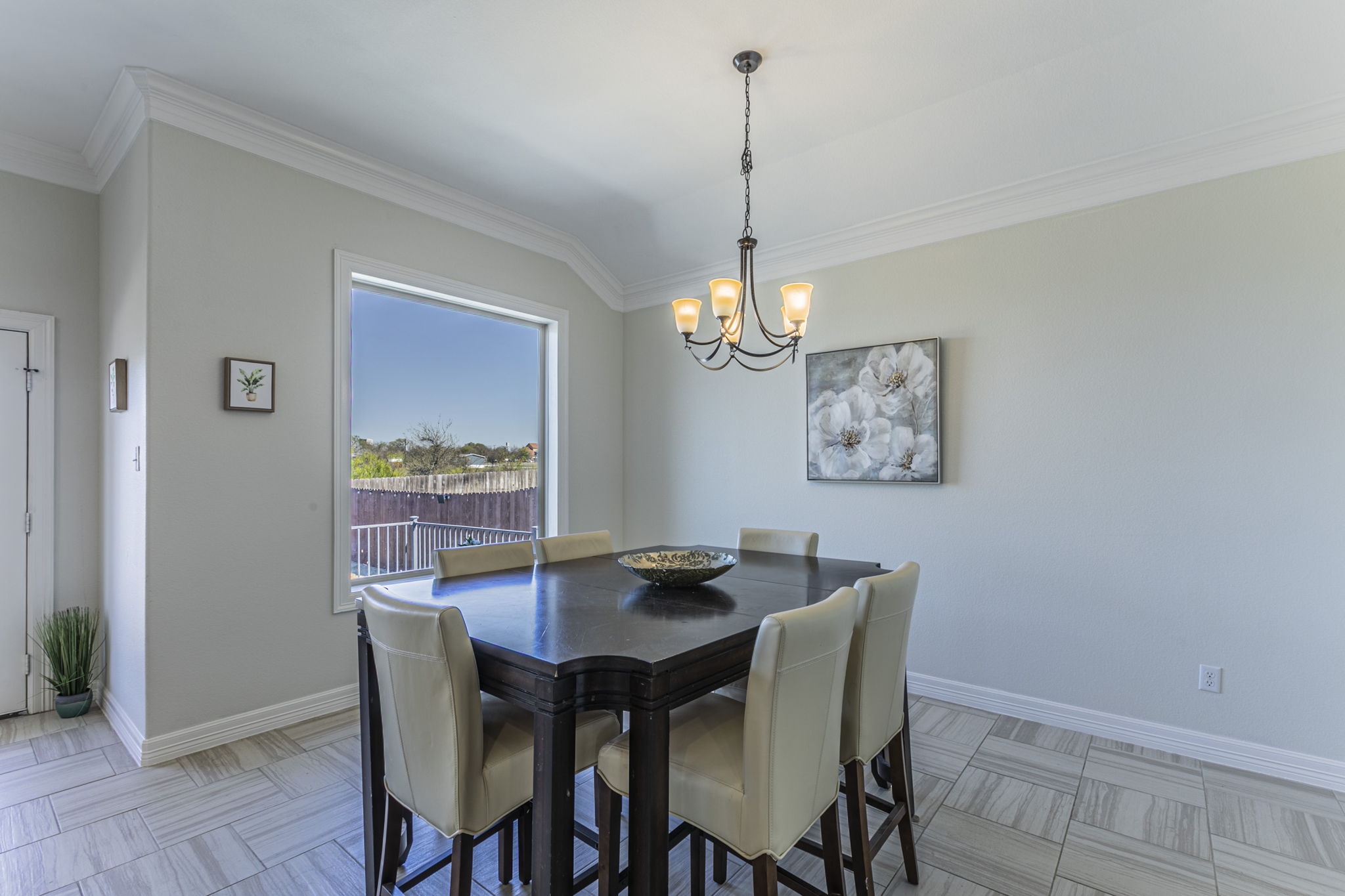 300 Magan Lane Jarrell, TX 76537 - Photo 9 of 33 Dining room with crown molding and hanging lights