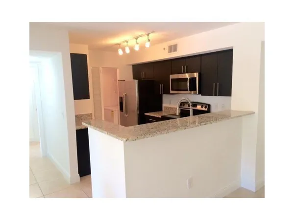 $280,000 | 4820 Highway 7, Unit 203, Coconut Creek, FL 33073