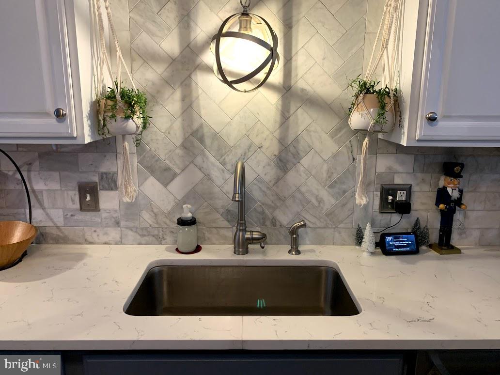 404 Mitti Road Reading, PA 19607 - Photo 14 of 37 a bathroom with a sink and a mirror