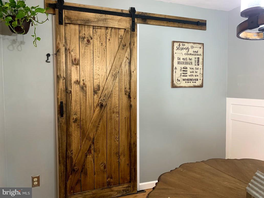 404 Mitti Road Reading, PA 19607 - Photo 17 of 37 a bedroom with a bed and a window
