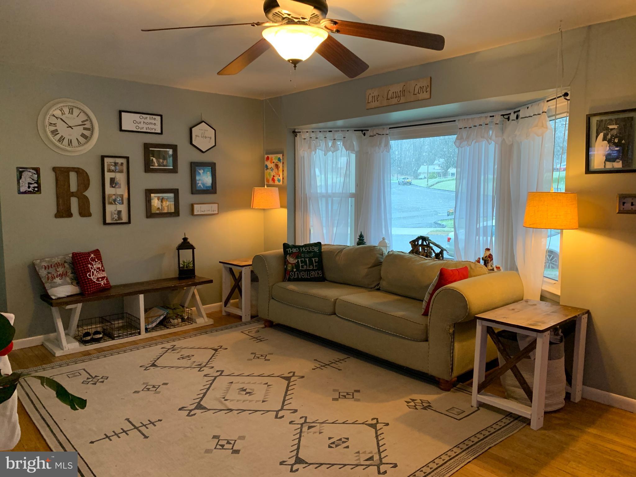 404 Mitti Road Reading, PA 19607 - Photo 4 of 37 a living room with furniture and wooden floor