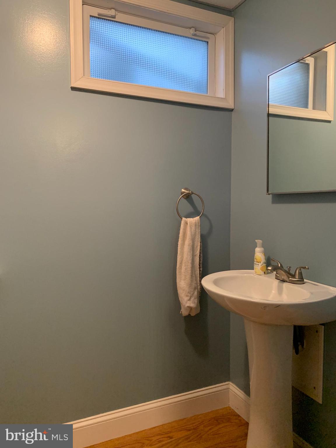 404 Mitti Road Reading, PA 19607 - Photo 31 of 37 a bathroom with a sink and a mirror