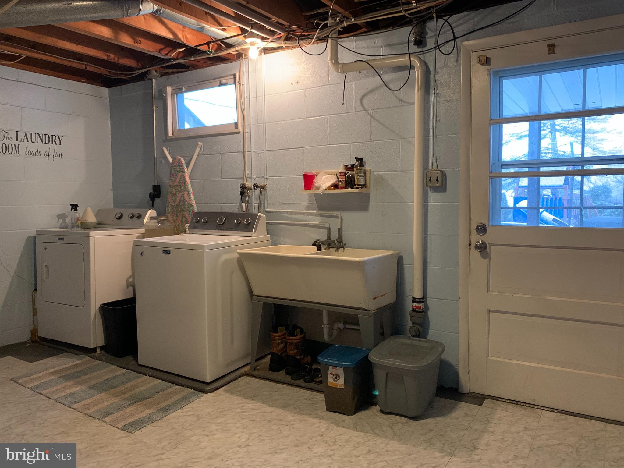 404 Mitti Road Reading, PA 19607 - Photo 32 of 37 a utility room with dryer and washer