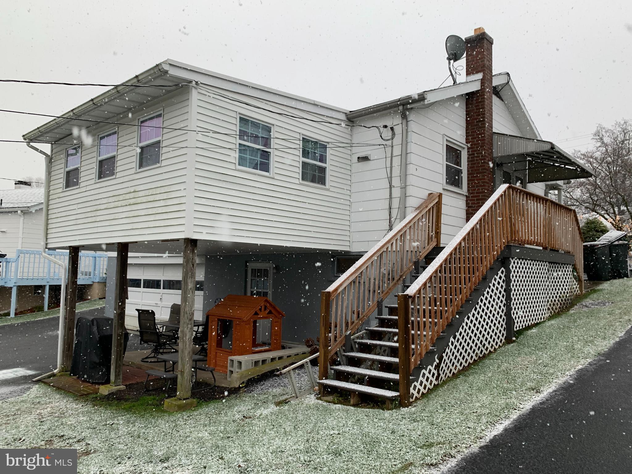 404 Mitti Road Reading, PA 19607 - Photo 34 of 37 a front view of a house with balcony and stairs