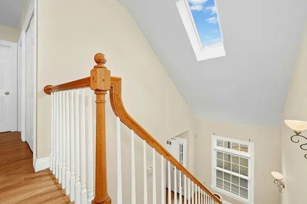 a view of a hallway with staircase