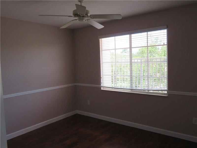 19430 Southwest 30th Street Miramar, FL 33029 - Photo 20 of 44 an empty room with a window and a fan