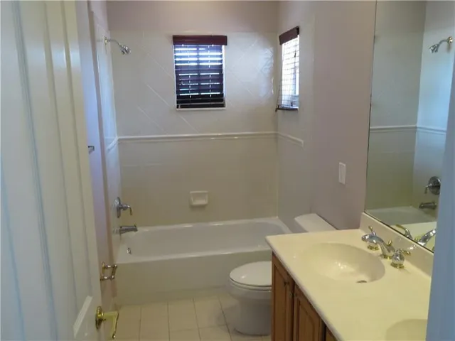 a view of a room that has a window in it