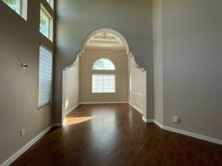 19430 Southwest 30th Street Miramar, FL 33029 - Photo 5 of 44 an empty room with wooden floor cabinet and windows