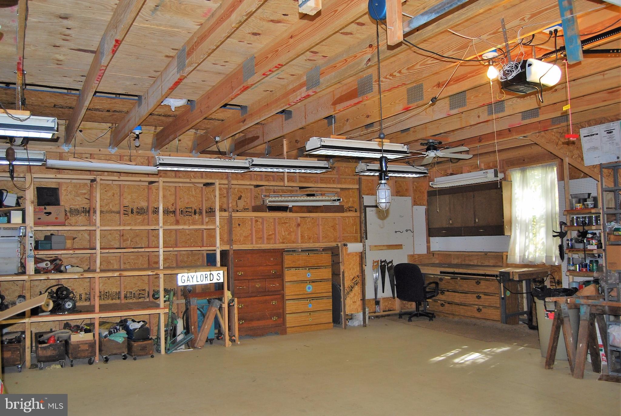602 Running Fox Road Lusby, MD 20657 - Photo 16 of 30 Garage with workshop area