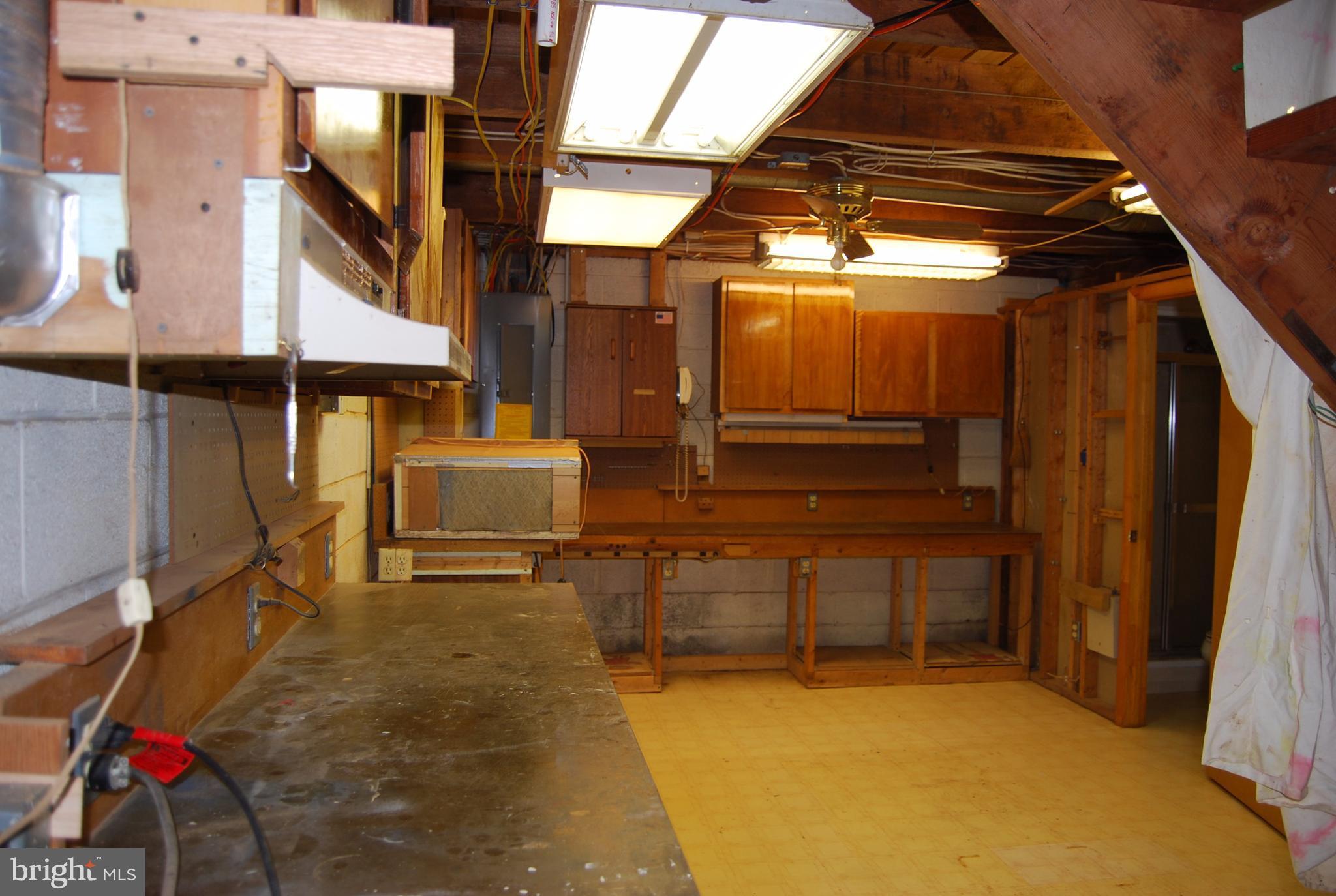 602 Running Fox Road Lusby, MD 20657 - Photo 23 of 30 Basement workshop