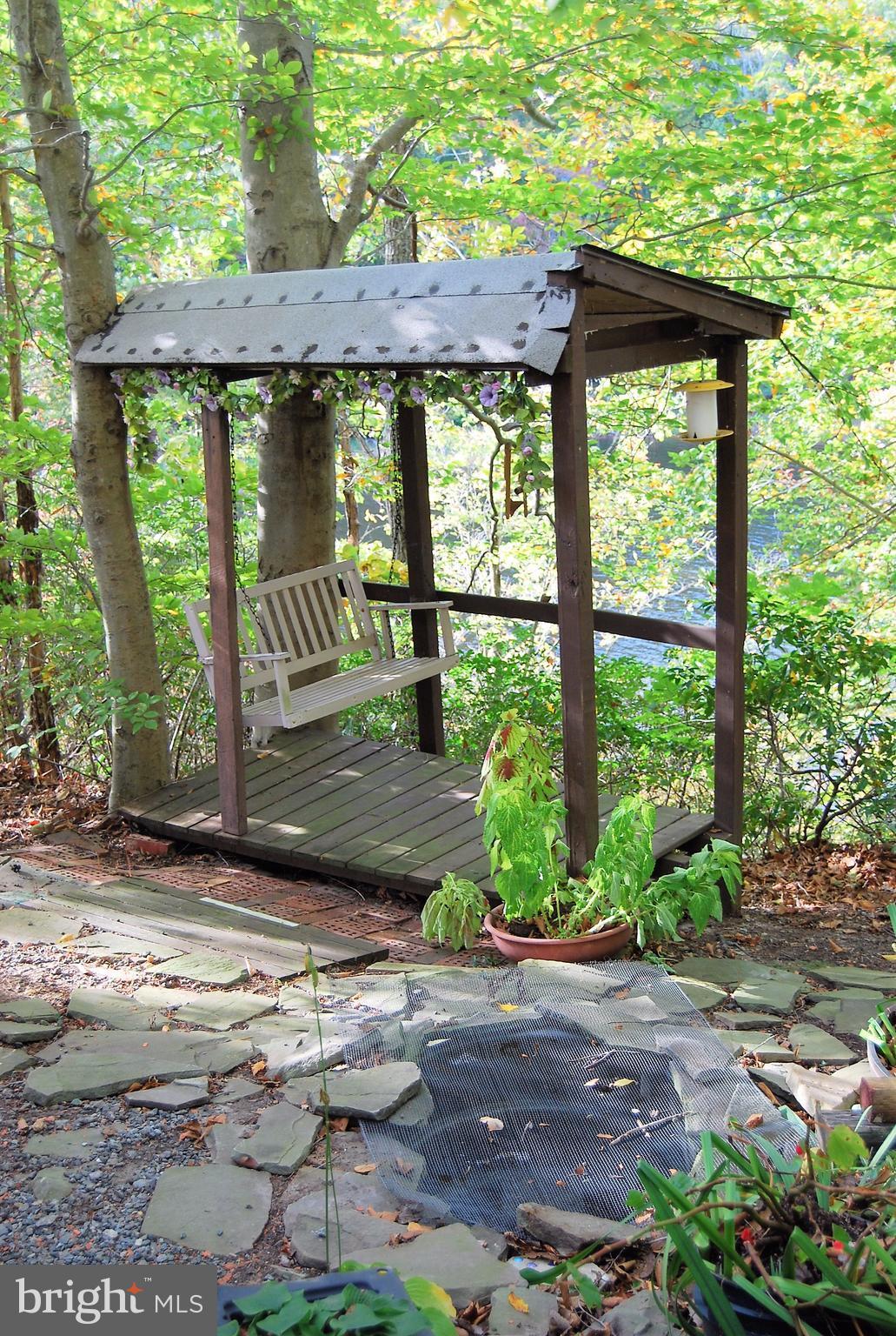 602 Running Fox Road Lusby, MD 20657 - Photo 30 of 30 Swing and pond