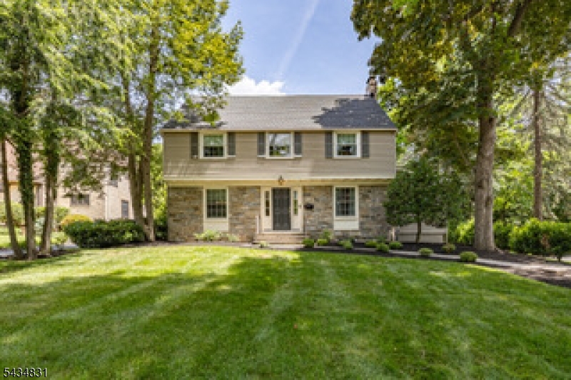 200 Wychwood Road Westfield, NJ 07090 - Photo 1 of 31 a front view of a house with a yard