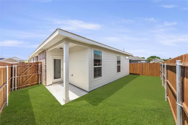 a view of a backyard with a garden