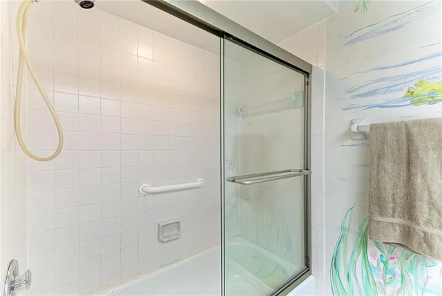 a view of a room with yard from a balcony