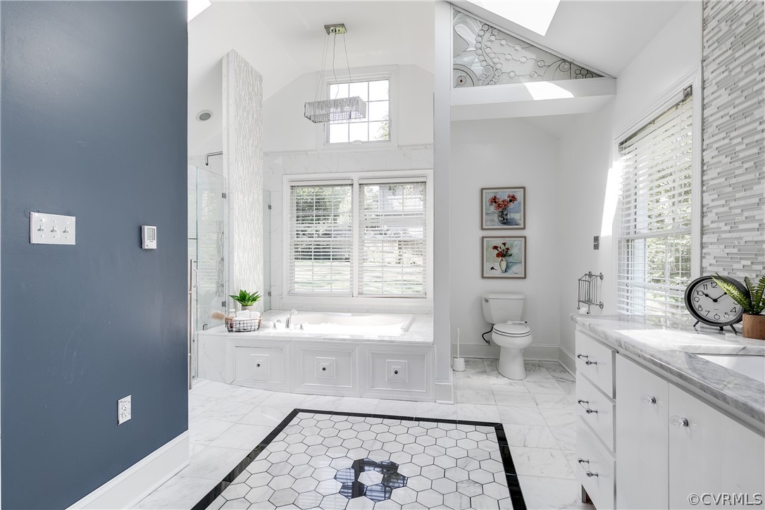 7607 Cherokee Road Richmond, VA 23225 - Photo 18 of 37 a bath room with a sink and a window