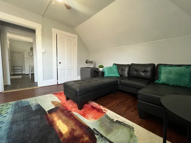 a living room with furniture and a couch