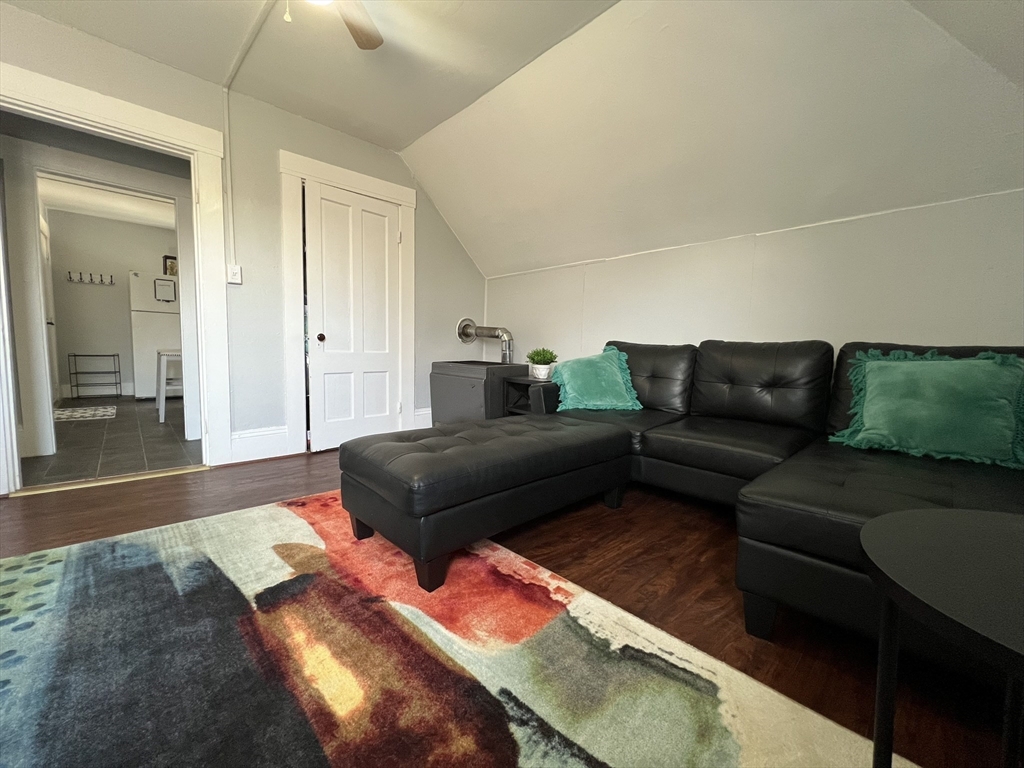 272 Front Street, Unit 5 Manchester, NH 03102 - Photo 6 of 19 a living room with furniture and a couch