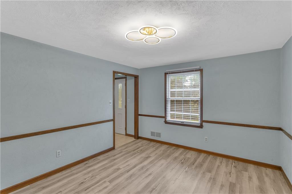 1792 McClure Road Monroeville, PA 15146 - Photo 9 of 41 Dining room with fresh paint and a new light fixture.
