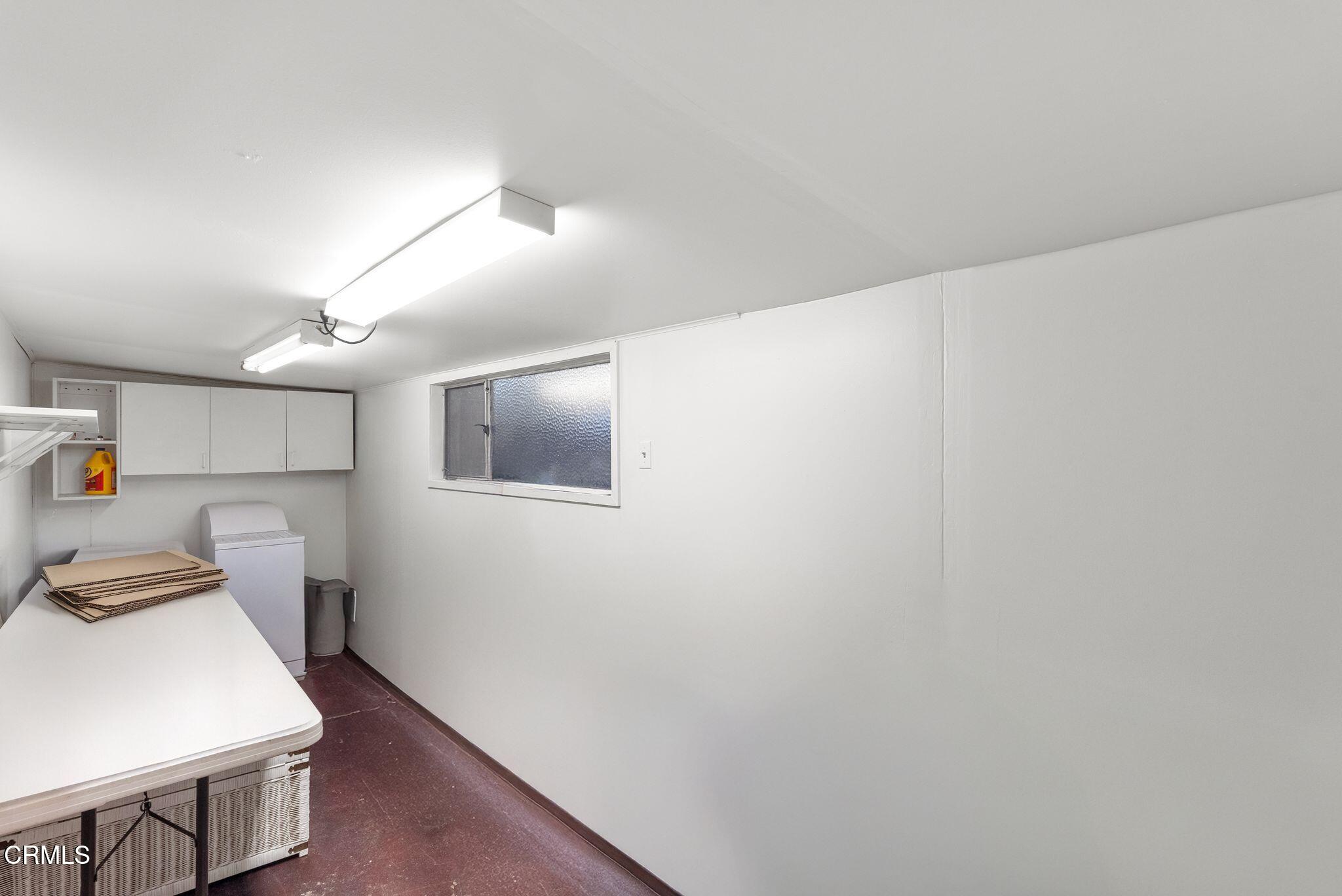 2102 North Eastern Avenue Los Angeles, CA 90032 - Photo 25 of 28 a room with storage and utility