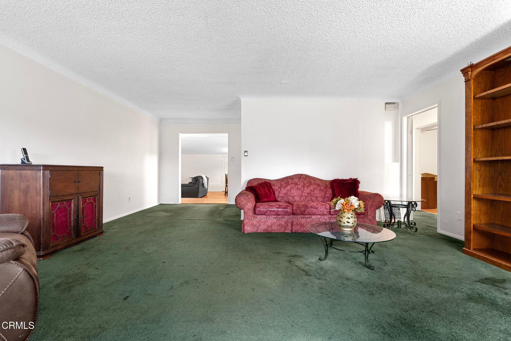 2102 North Eastern Avenue Los Angeles, CA 90032 - Photo 4 of 28 a living room with furniture and a couch