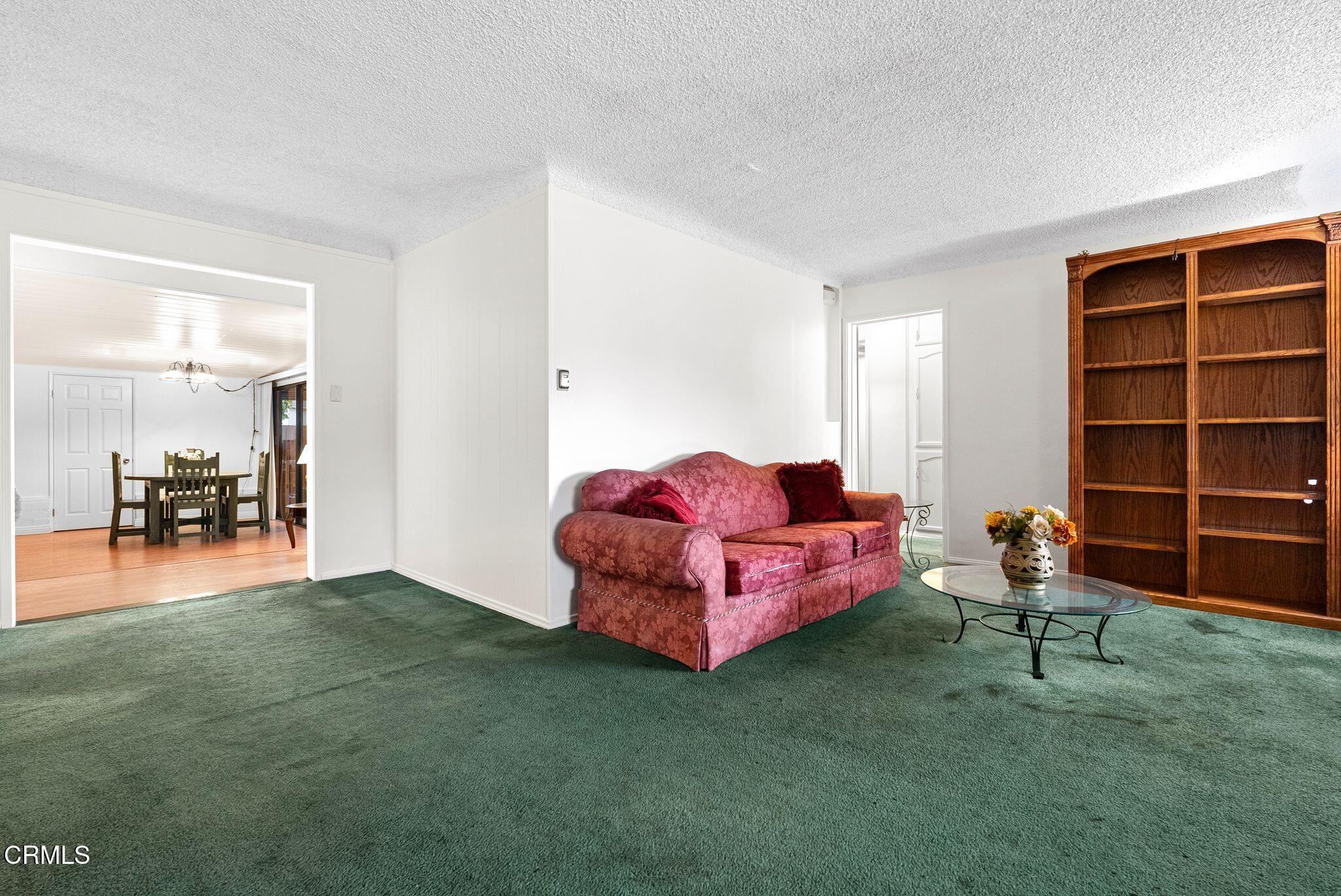 2102 North Eastern Avenue Los Angeles, CA 90032 - Photo 5 of 28 a living room with furniture and a wooden floor