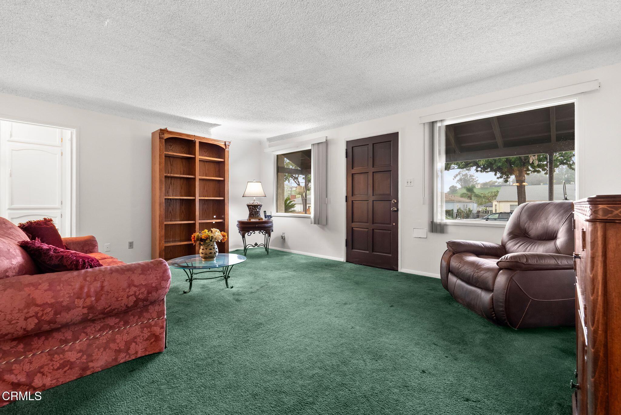 2102 North Eastern Avenue Los Angeles, CA 90032 - Photo 7 of 28 a living room with furniture and a window