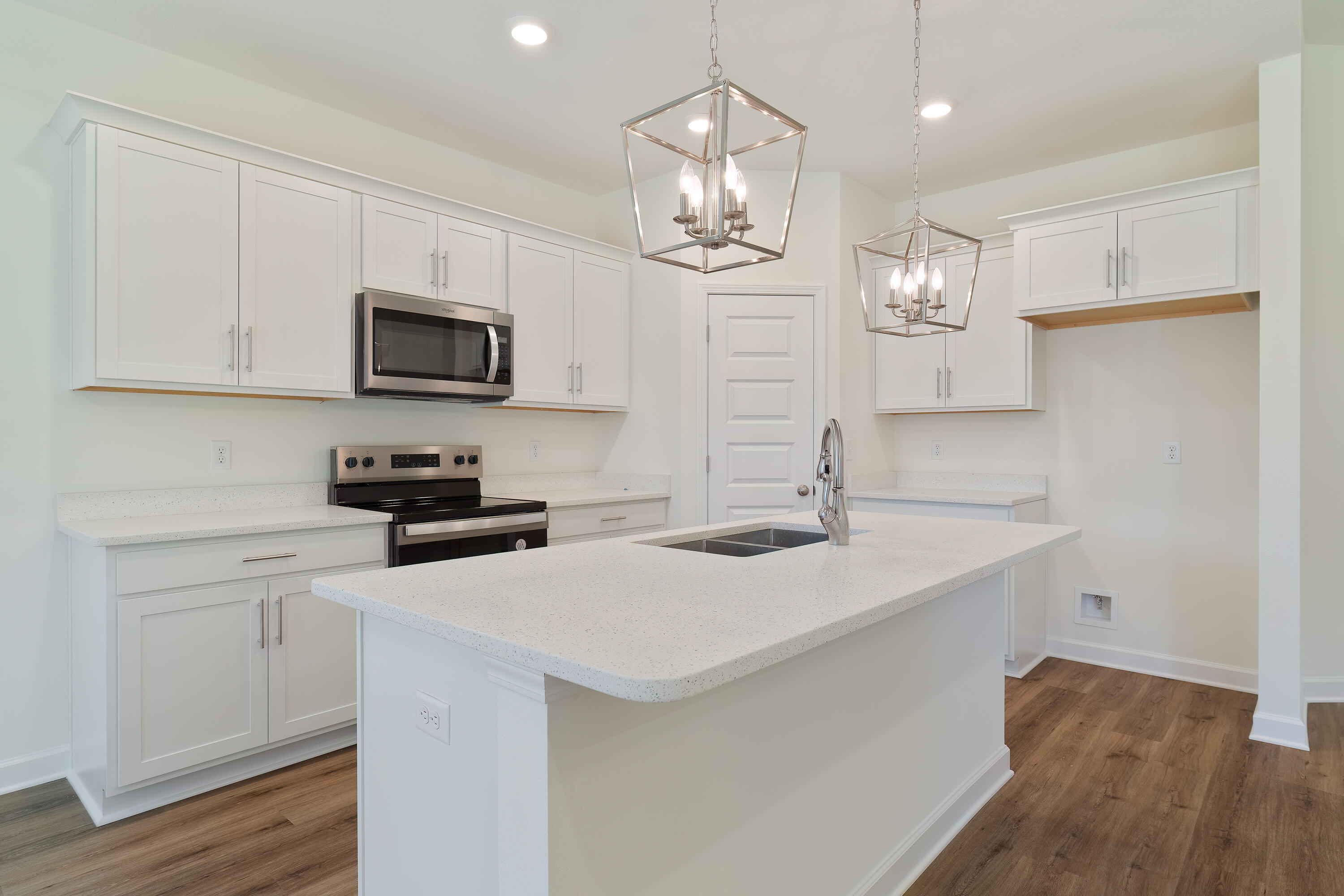 4339 Cooper Lane Holt, FL 32564 - Photo 8 of 16 a kitchen with appliances a sink and cabinets