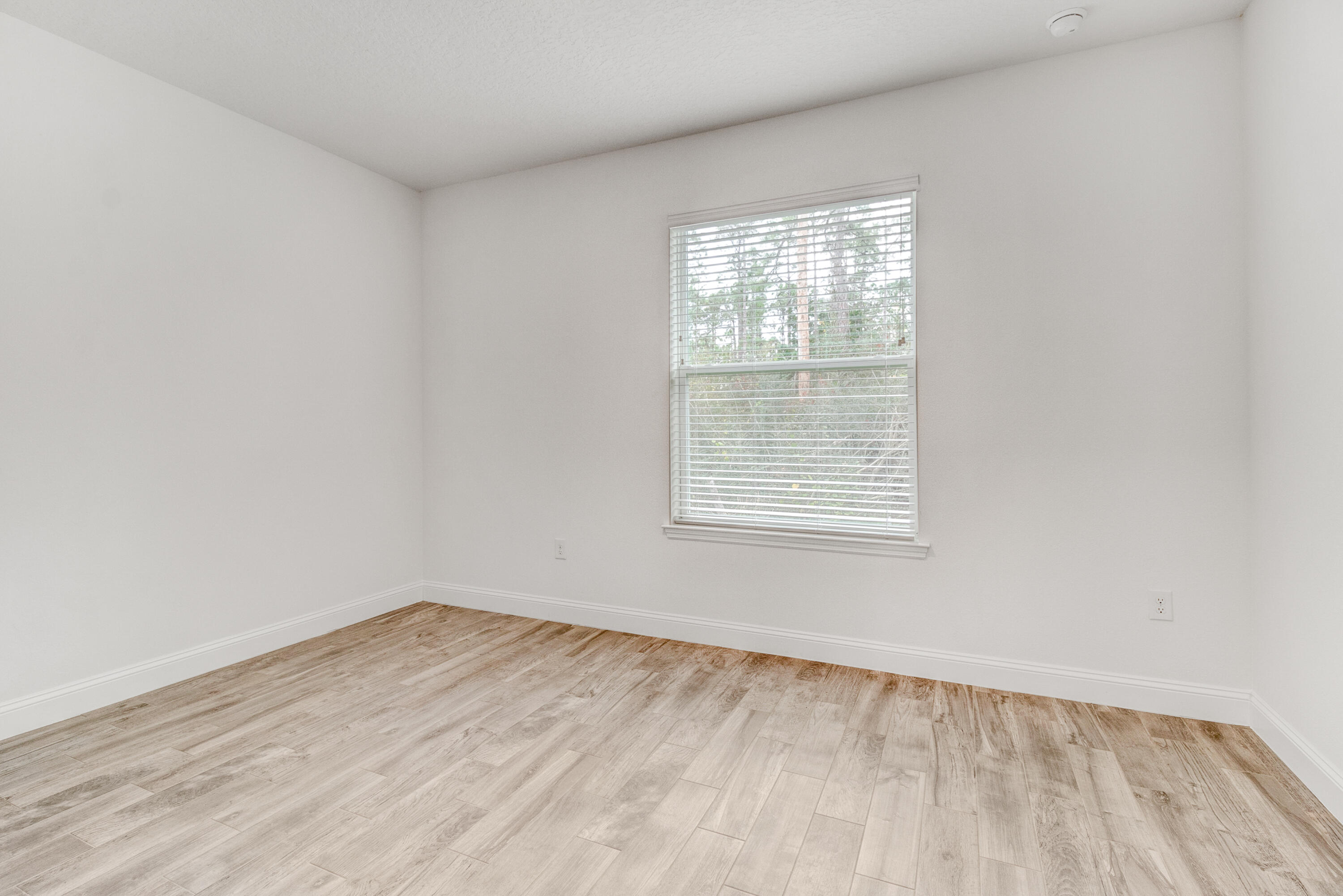 584 Octavius Road Southwest Palm Bay, FL 32908 - Photo 24 of 30 an empty room with a window