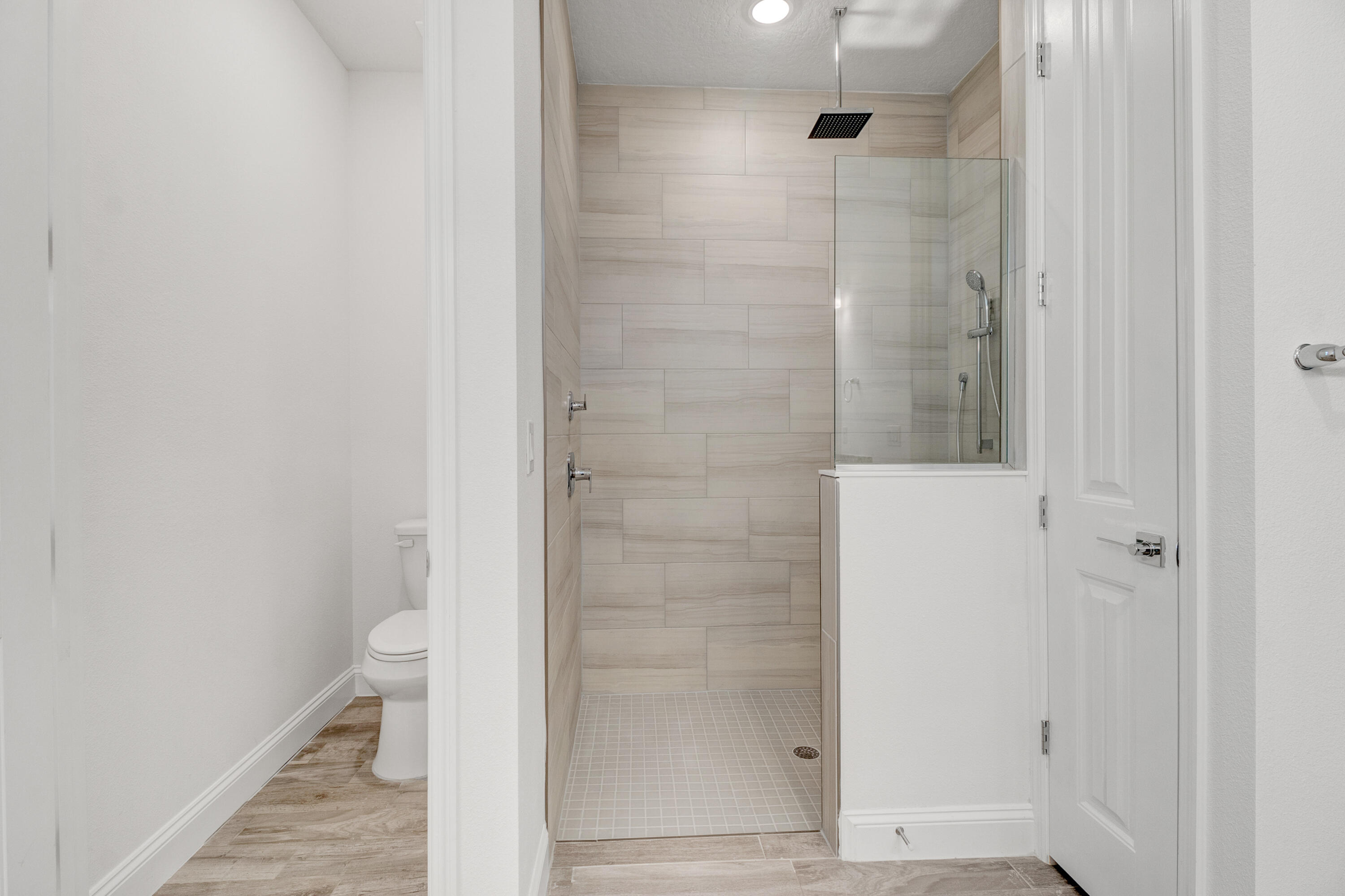 584 Octavius Road Southwest Palm Bay, FL 32908 - Photo 30 of 30 a bathroom with a glass shower door