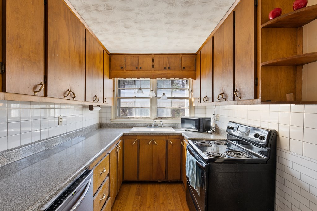 4170 Old Highway 5 Blue Ridge, GA 30513 - Photo 20 of 29 a kitchen with a sink stove and cabinets
