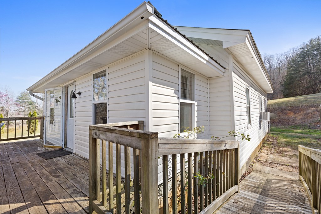 4170 Old Highway 5 Blue Ridge, GA 30513 - Photo 29 of 29 a view of a house with backyard and deck