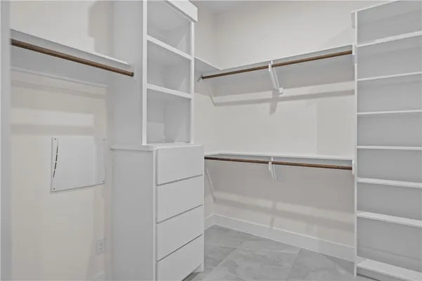 a view of an empty walk in closet