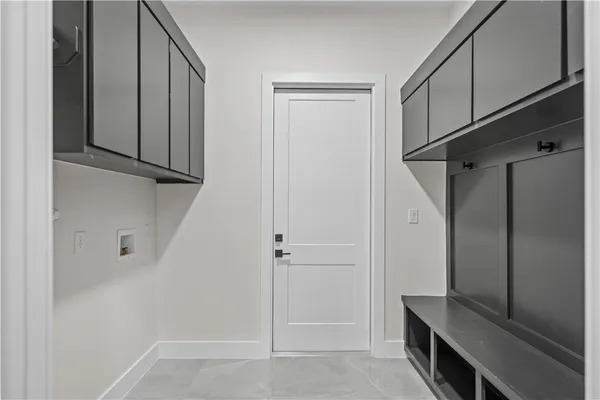 a view of room with cabinets