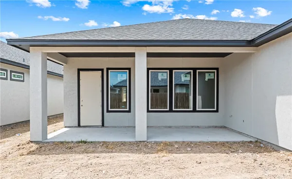 a view of entrance gate of a house