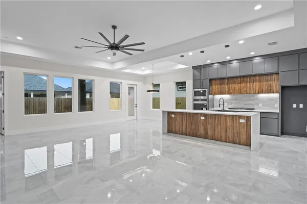 a large living room with a large window