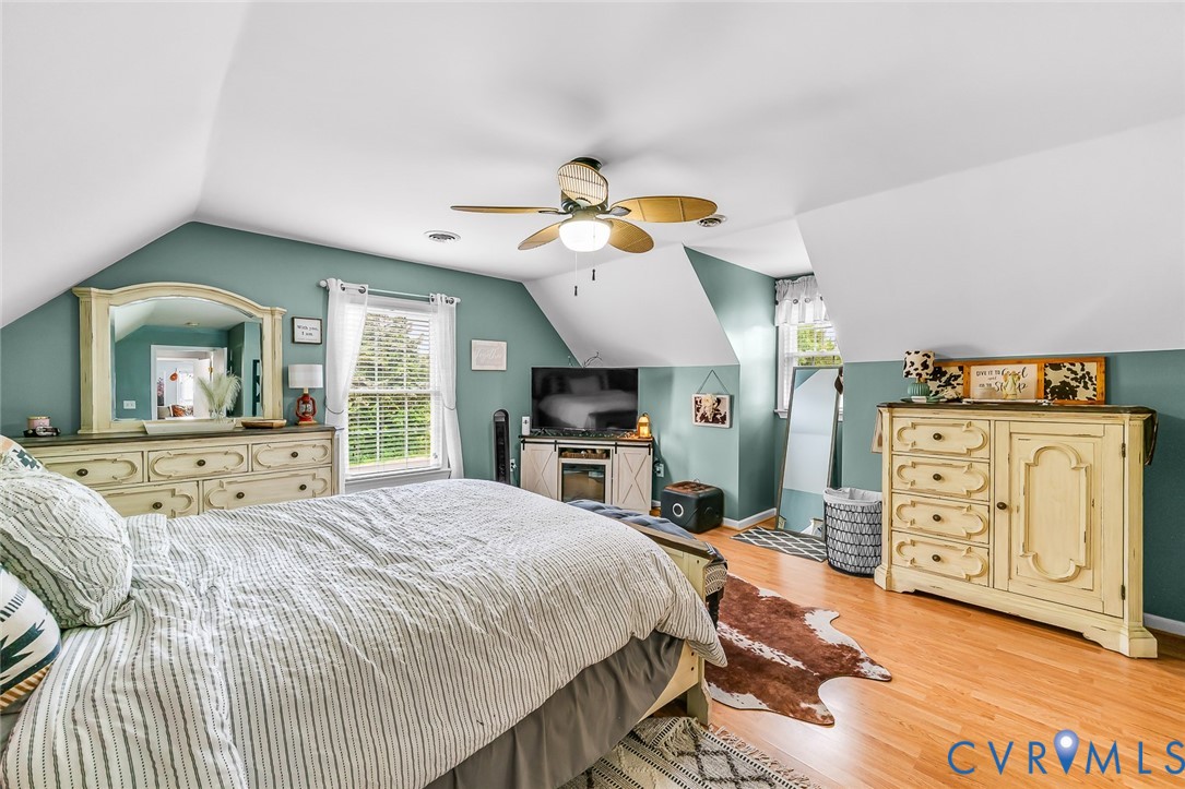 234 Poplar Road Aylett, VA 23009 - Photo 20 of 31 Attic room featuring wood-finish flooring, pitched