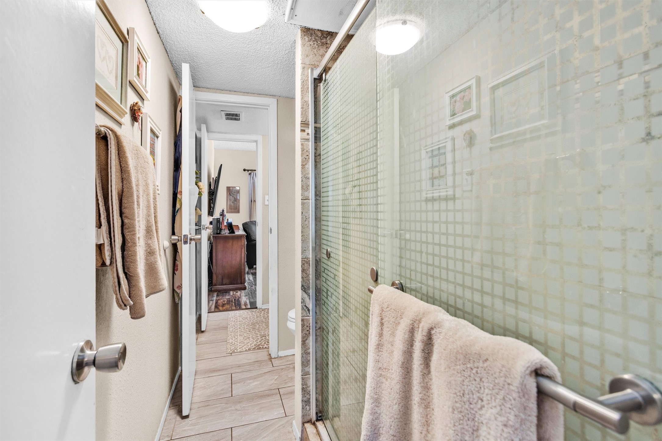 12900 Walden Road, Unit 814H Montgomery, TX 77356 - Photo 22 of 42 Downstairs bathroom with walk-in shower