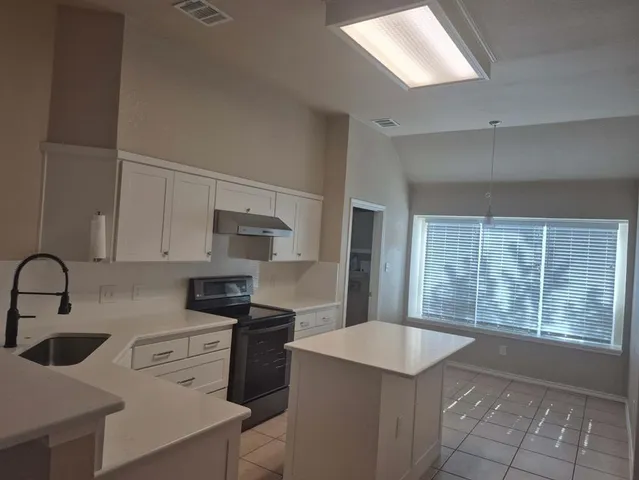 a view of a livingroom with a window