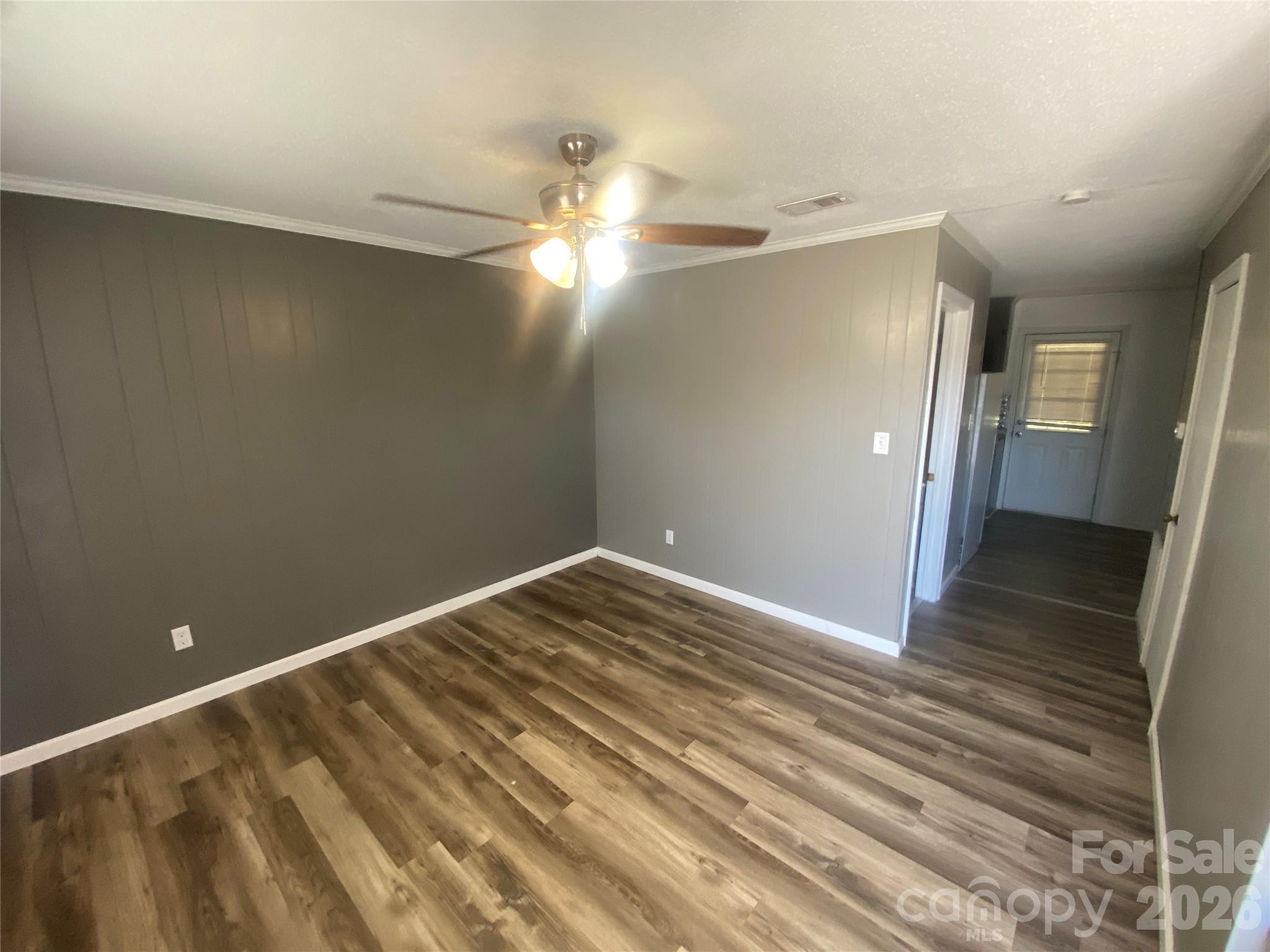788 Coley Road Salisbury, NC 28146 - Photo 30 of 43 a view of empty room with wooden floor