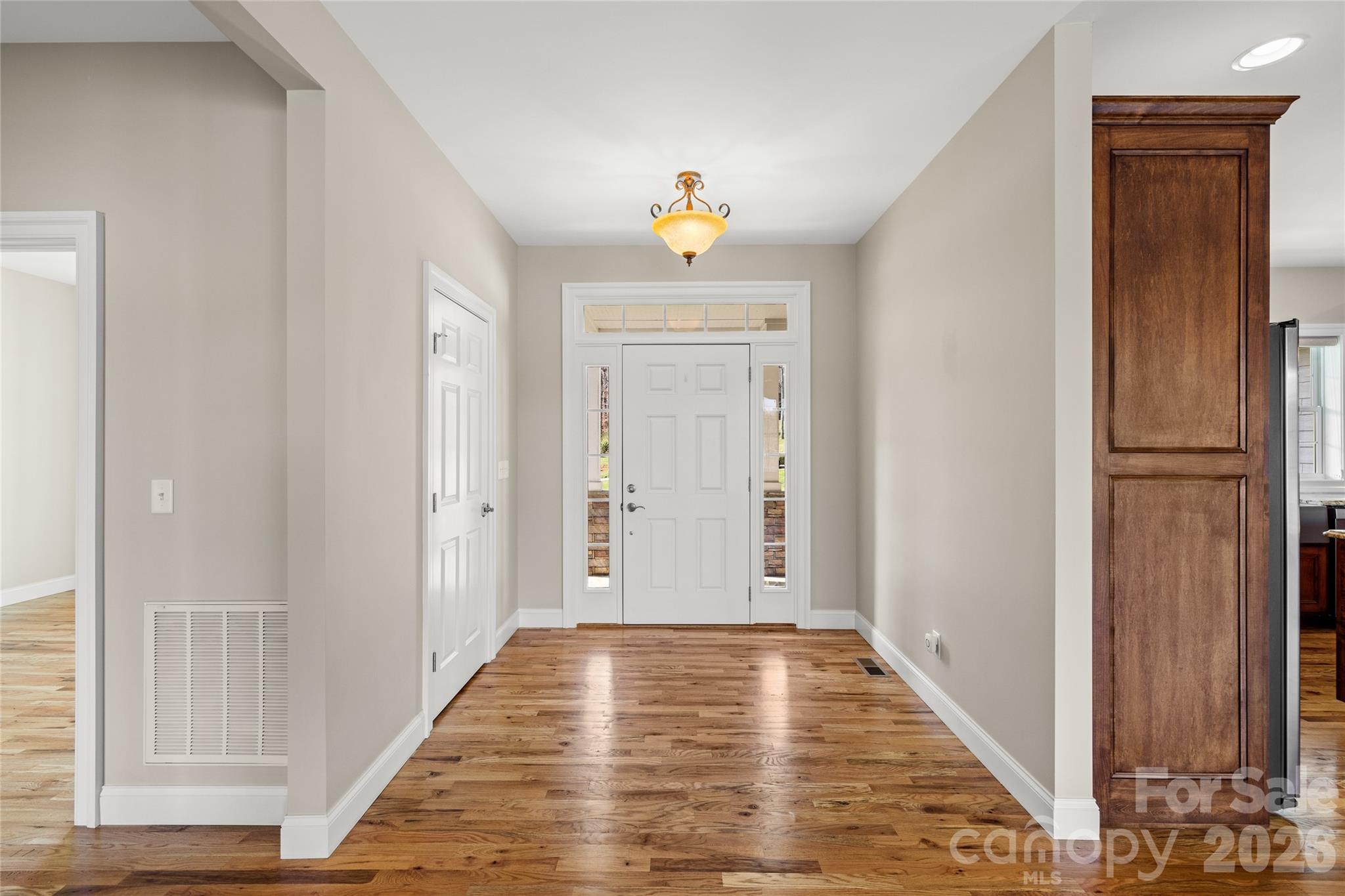 490 Mapleton Lane Columbus, NC 28722 - Photo 15 of 42 a view of an entryway with wooden floor