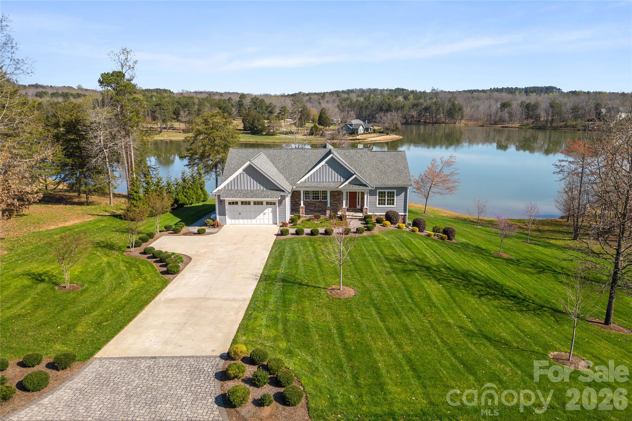 490 Mapleton Lane Columbus, NC 28722 - Photo 2 of 42 a view of a house with a yard