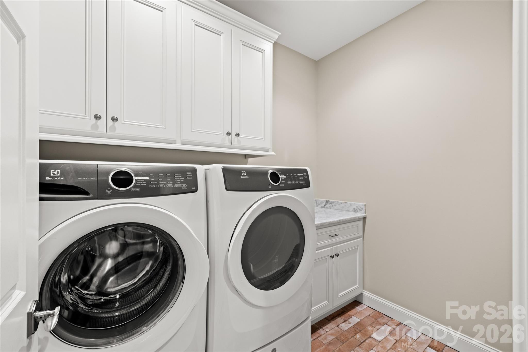 490 Mapleton Lane Columbus, NC 28722 - Photo 22 of 42 a utility room with dryer and washer