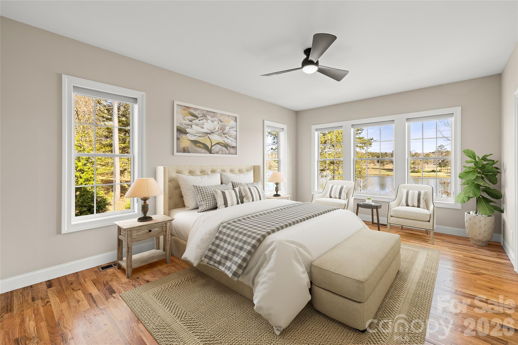 490 Mapleton Lane Columbus, NC 28722 - Photo 24 of 42 a spacious bedroom with a large bed and a large window
