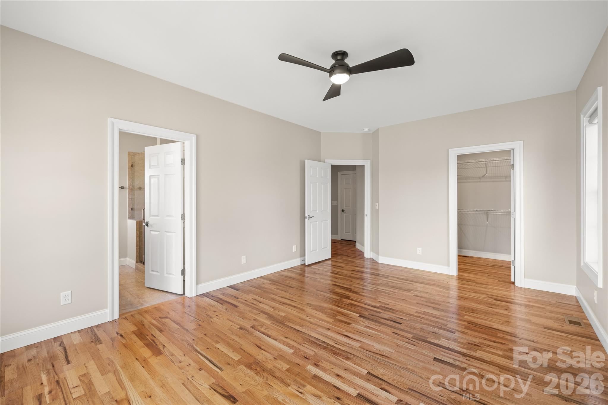490 Mapleton Lane Columbus, NC 28722 - Photo 25 of 42 a view of empty room with wooden floor