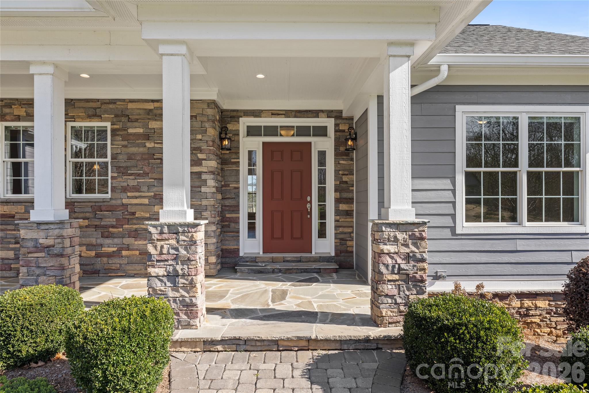 490 Mapleton Lane Columbus, NC 28722 - Photo 3 of 42 a front view of a house with a yard