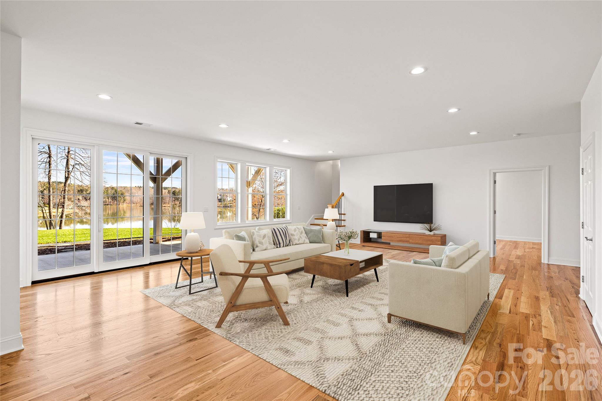 490 Mapleton Lane Columbus, NC 28722 - Photo 35 of 42 a living room with furniture and a flat screen tv