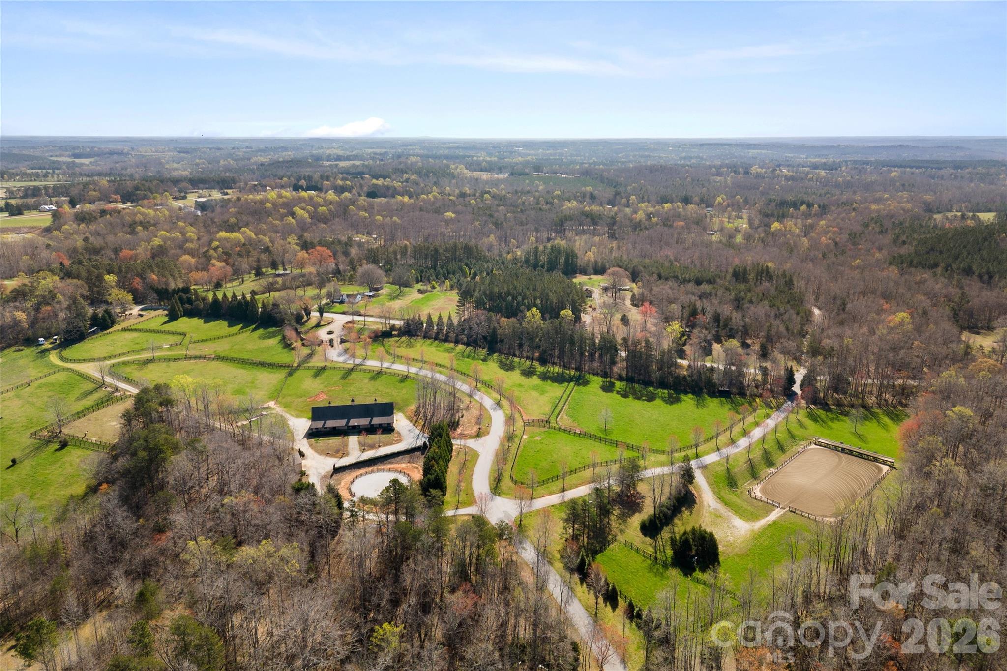 490 Mapleton Lane Columbus, NC 28722 - Photo 41 of 42 an aerial view of a house with a swimming pool yard and mountain view in back