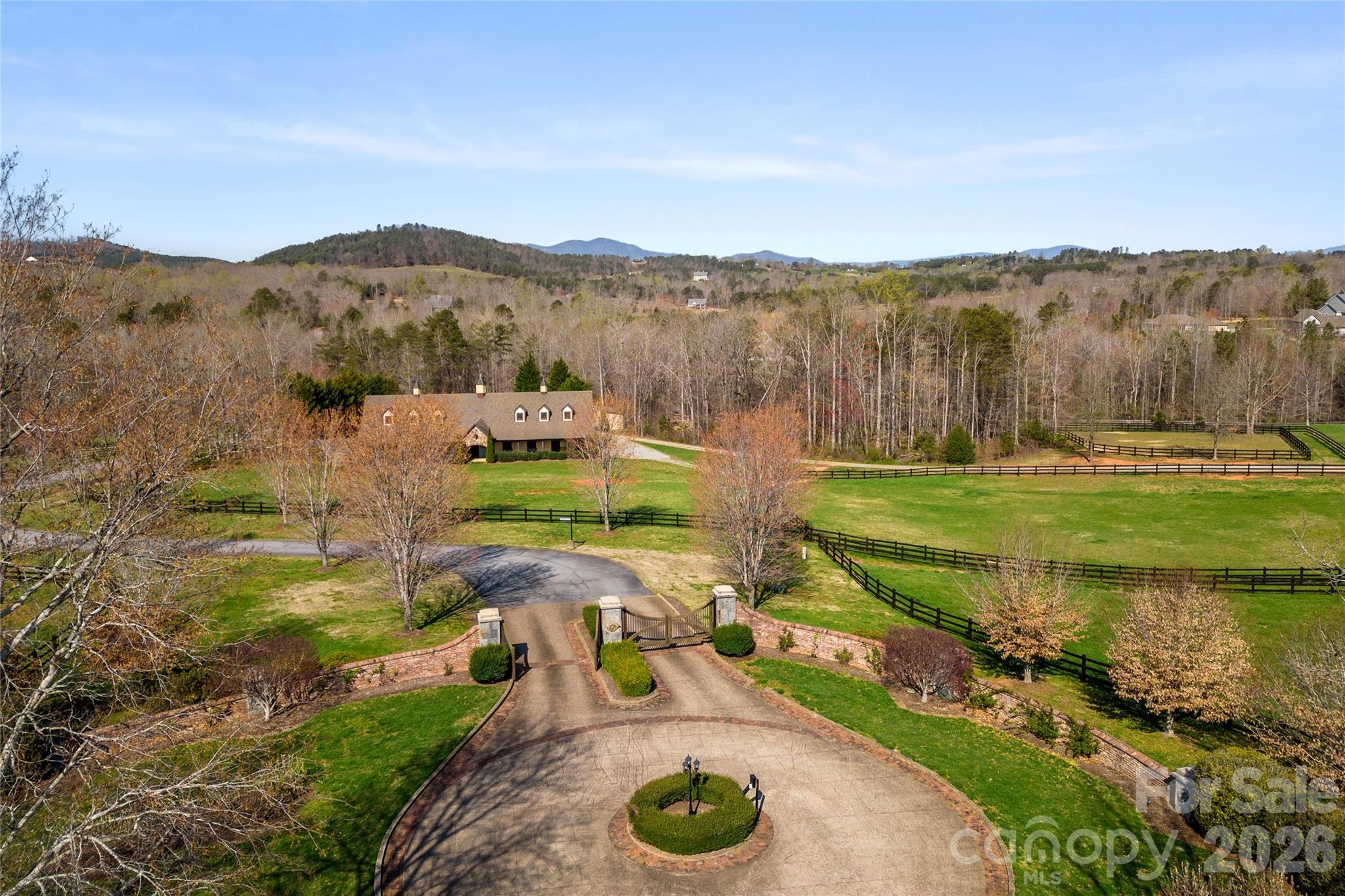 490 Mapleton Lane Columbus, NC 28722 - Photo 42 of 42 a view of a lake with a mountain