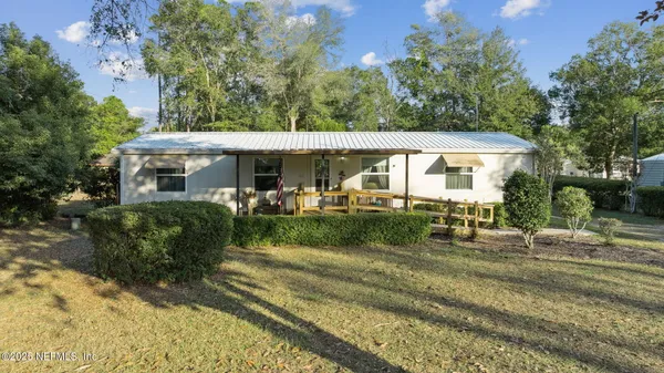 a view of a house with a patio