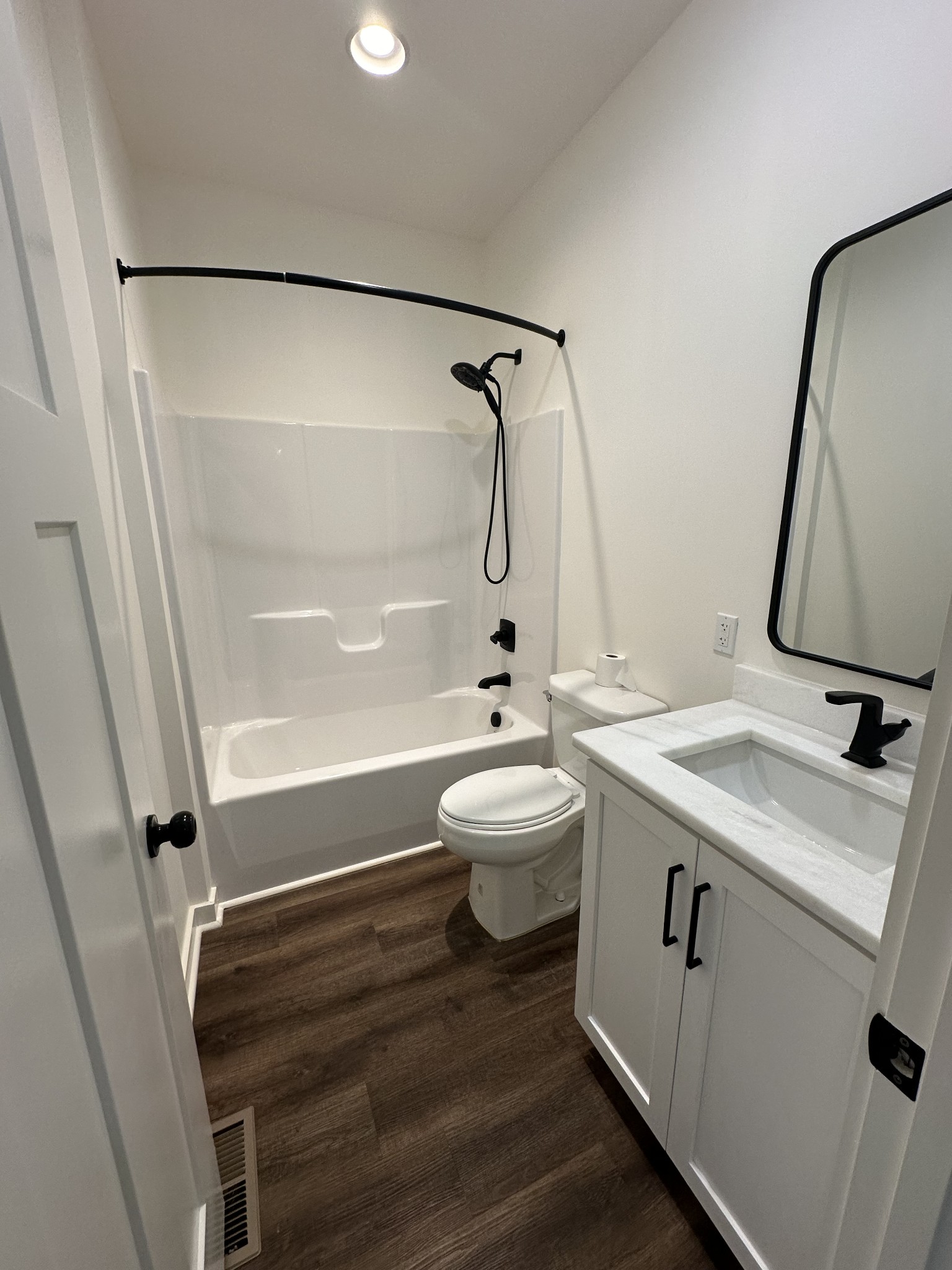 65 Duncan Lane Winchester, TN 37398 - Photo 7 of 11 a bathroom with a sink a toilet and shower